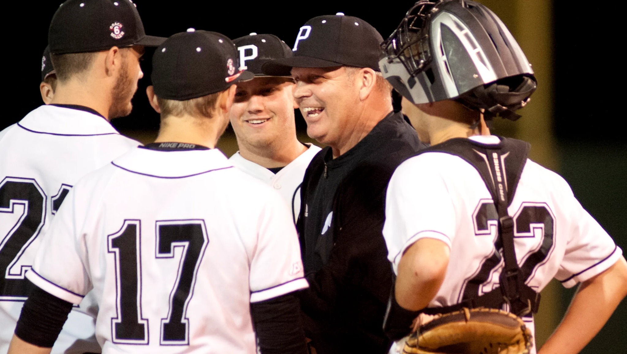 Coach meeting with players